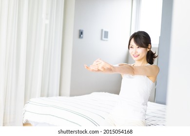 Young Woman Waking Up Refreshed