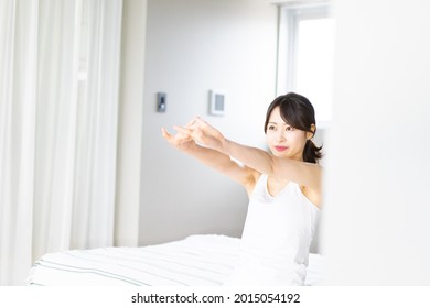 Young Woman Waking Up Refreshed