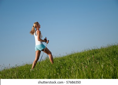 Young Woman Is Walking In Her Spare Time