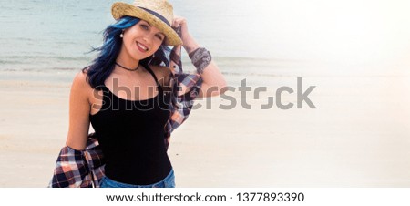 young woman walking on the beach, vacation concept