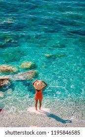 Young Woman Walking At Pebble Beach Monterosso On Vacation Cinque Terre Monterosso Al Mare Pebble Beach Cinque Terre, Italy 