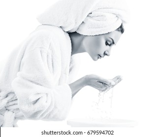 Young Woman Washing Face With Clean Water.