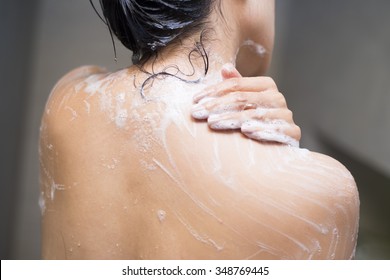 Young Woman Washing Her Body With Shower Gel, Healthcare