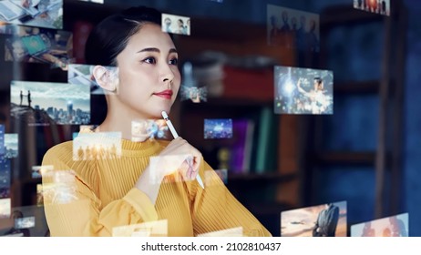 Young Woman Watching Hologram Screens. Graphic Designer. Digital Contents.