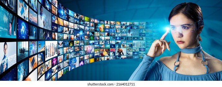 Young woman watching stereoscopic images with virtual reality goggles. Digital contents concept. Social networking service. Streaming video. NFT. Non-fungible token. - Shutterstock ID 2164012711