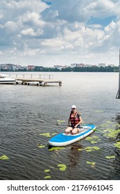  Young Woman Wear Life Vest Paddle Boarding On A Lovely Lake At Summer Hot Day, Active Lifestyle Sport And Relax