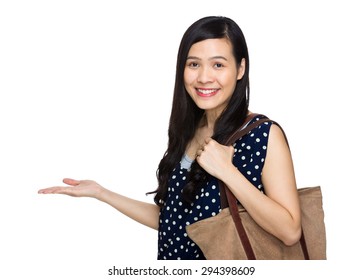 Young Woman Wear A Shoulder Bag And Open Hand Palm