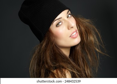 Young Woman Wearing Black Beanie Knitted Hat.