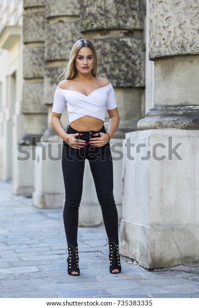 black jeans and white crop top