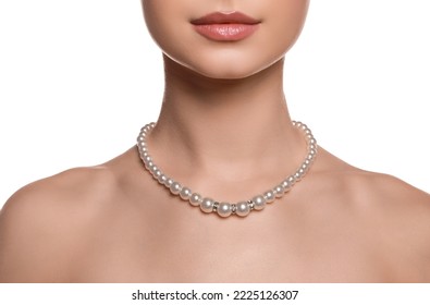 Young woman wearing elegant pearl necklace on white background, closeup - Powered by Shutterstock