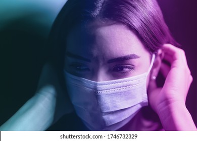 Young Woman Wearing Face Surgical Mask Against Corona Virus - Fear Girl Quarantine For Preventing Pandemic Spread Of Coronavirus - Mental Health Impact During Covid19 And Anxiety People Concept