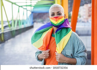 Young Woman Wearing Gay Pride Mask - Lgbt Rights Concept