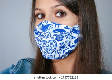 Young Woman Wearing Home Made, Protective, Face Mask. Self Isolation, Quarantine, Protection Against Covid 19, Corona Virus. Close Up At Home.