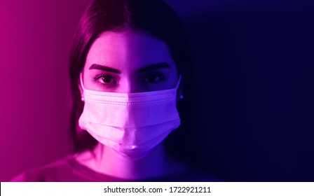 Young Woman Wearing Medical Mask Against Corona Virus - Fear Girl Quarantine For Preventing Pandemic Spread Of Coronavirus - Mental Health Impact For Covid19 And Anxiety People Concept
