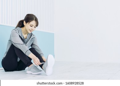 Young woman wearing shoes. Fitness. Training. - Powered by Shutterstock