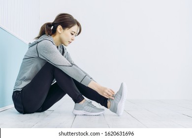 Young woman wearing shoes. Fitness. Training. - Powered by Shutterstock