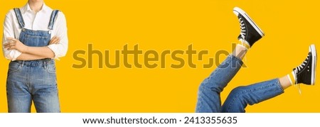 Young woman wearing stylish jeans overall and gumshoes on yellow background with space for text
