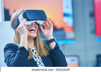 Young woman wearing virtual reality device