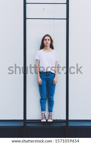 Similar – Portrait Woman Wall White