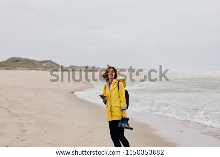 Similar – Pretty healthy woman enjoying a hike on a beach