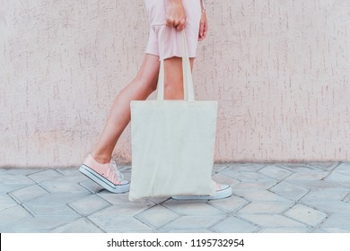 Young Woman With White Cotton Bag In Her Hands.