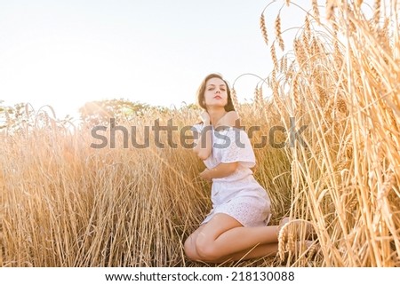 Similar – Young woman doing yoga in nature