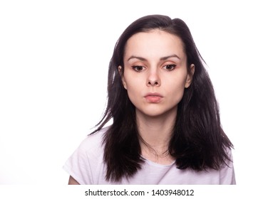 young woman in white t-shirt on white background - Shutterstock ID 1403948012