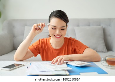 Young Woman Wife In Budget Planning Concept