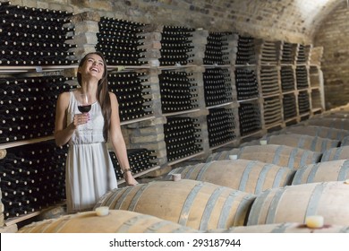 Young Woman In The Wine Cellar