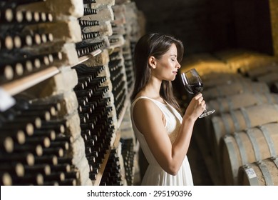 Young Woman In The Wine Cellar