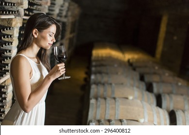 Young Woman In The Wine Cellar