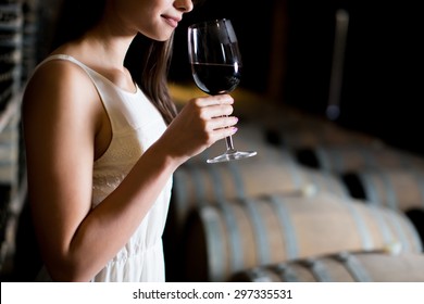 Young Woman In The Wine Cellar