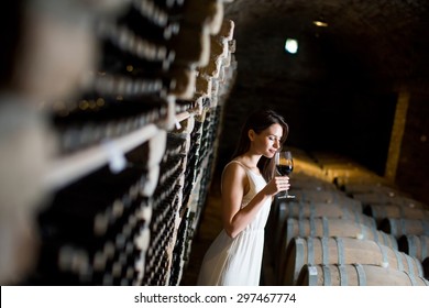 Young Woman In The Wine Cellar