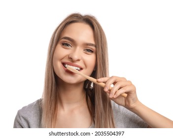 Young Woman With Wooden Tooth Brush On White Background