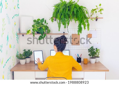 Young Woman working from home 