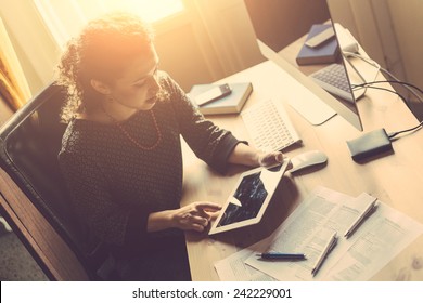 Young Woman Working At Home, Small Office