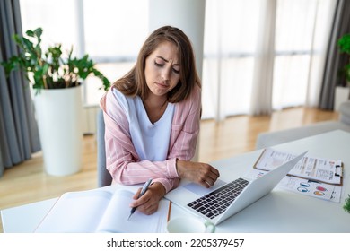 Young Woman Working Laptop. Business Woman Busy Working On Laptop Computer At Office. Businesswoman Sitting At Bright Modern Work Station And Typing On Laptop