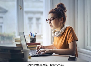 Young woman working on a laptop.