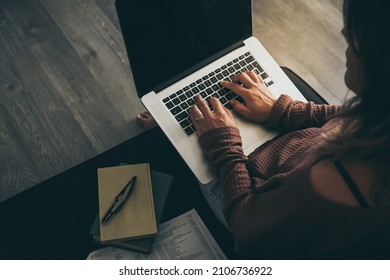 Young Woman Working On Laptop At Home. Female Hands Typing On Pc Keyboard. Teenager Making An Internet Video Call With Remote Friends. Girl Studying Online. Technology, Youth, Teen, New Life  Concept