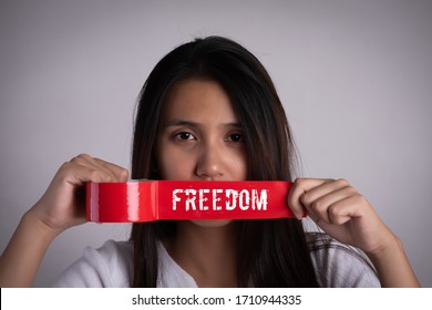 Images Of A Woman In Chains With Her Head Wrapped In Red Cloth Background,  Picture Of Oppression Background Image And Wallpaper for Free Download