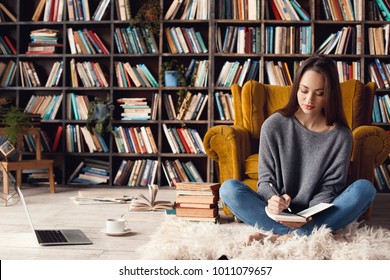 Young Woman Writer In Library At Home Creative Occupation Sitting Writing Notes