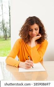 Young Woman Writing A Letter