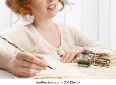 Young Woman Writing A Letter