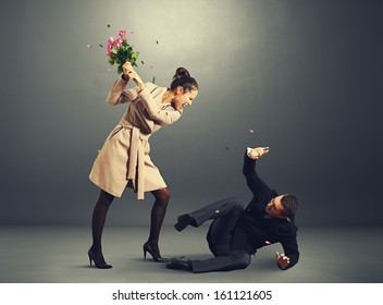 Young Woman Yelling At Frightened Man