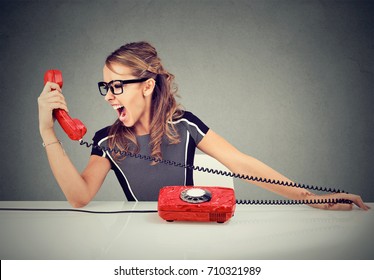 Young Woman Yelling On The Phone