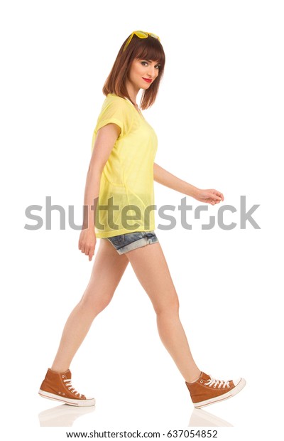 Young Woman Yellow Shirt Jeans Shorts Stock Photo (Edit Now) 637054852