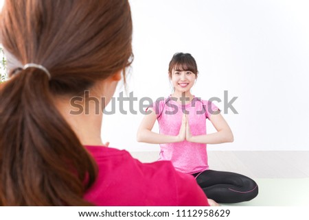 Young woman at Yoga class