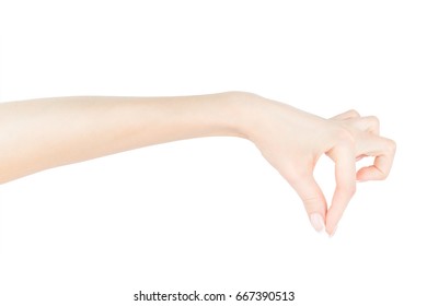 A Young Woman's Or Girl's Hand Holding, Picking Or Pulling Something With Her Thumb And Index Finger, Isolated, White Background