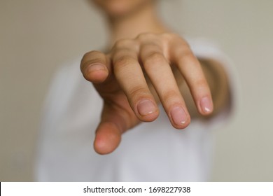 Young Woman's Hand Reaching Out