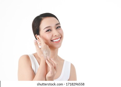 Young Women Apply Nourishing Cream To The Skin On The Back Of The Hand To Be Moist, Not Dry. Concept Of Beauty And Health Care. Clipping Path. Isolated